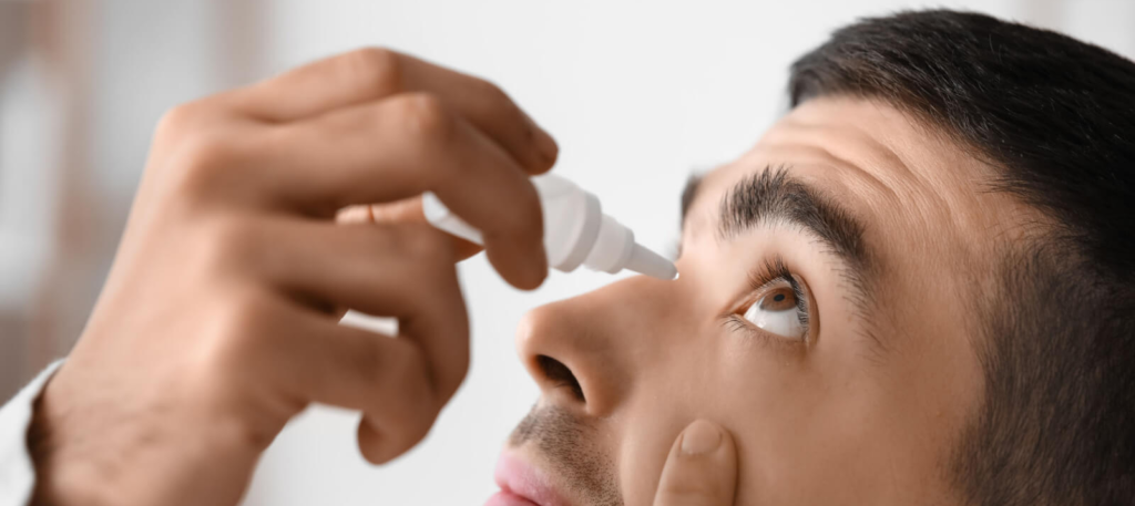 man-putting-in-eye-drops-1024x672